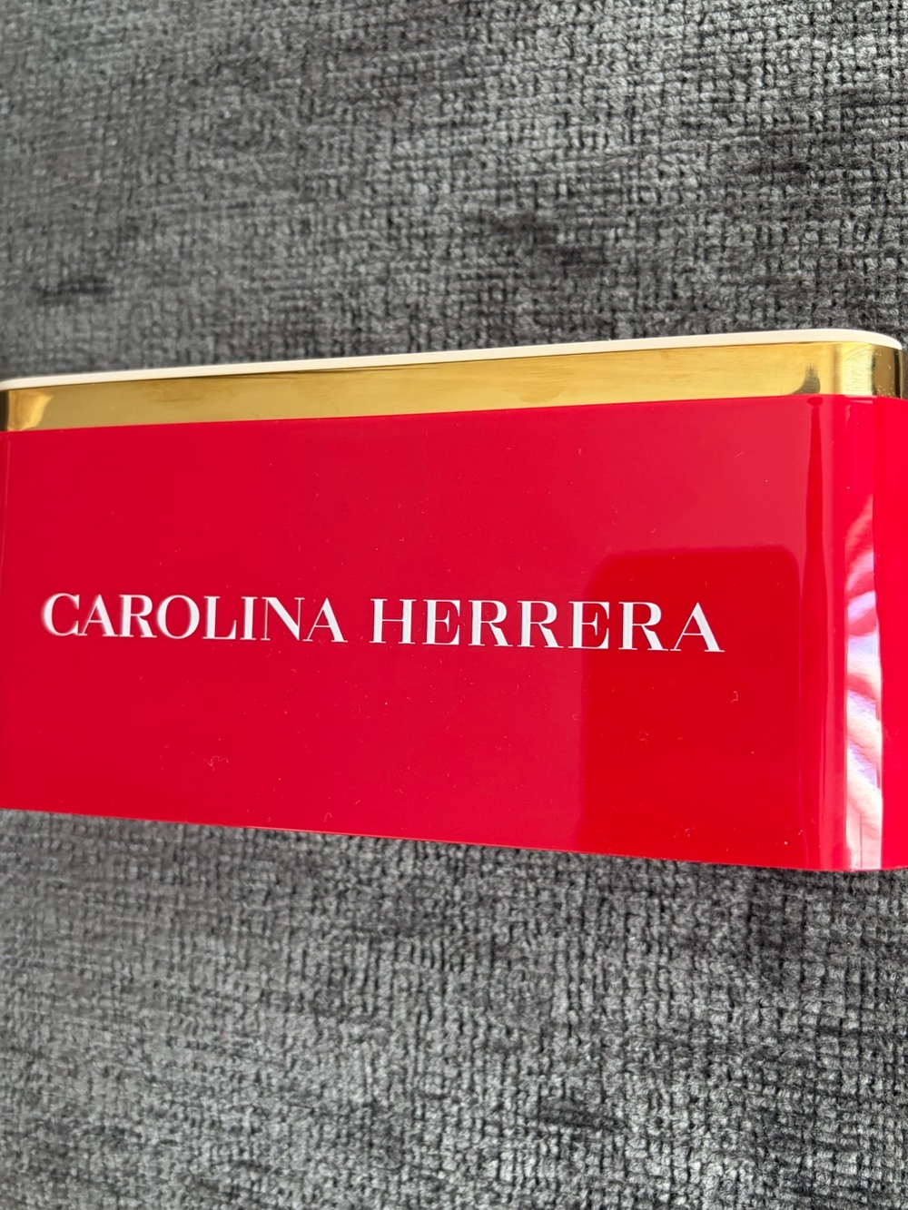 Carolina Herrera Red and Gold Decorative display plaque